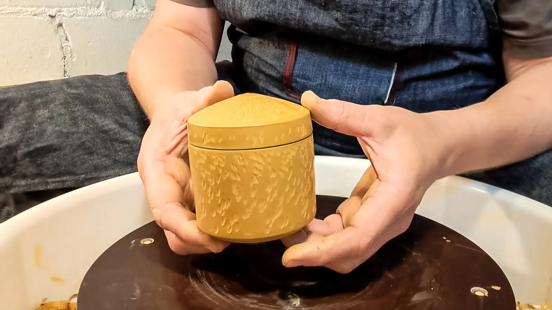 Video caption: Throwing and trimming a small closed form lidded jar