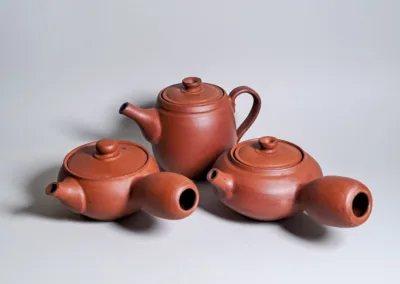 Red stoneware tepots