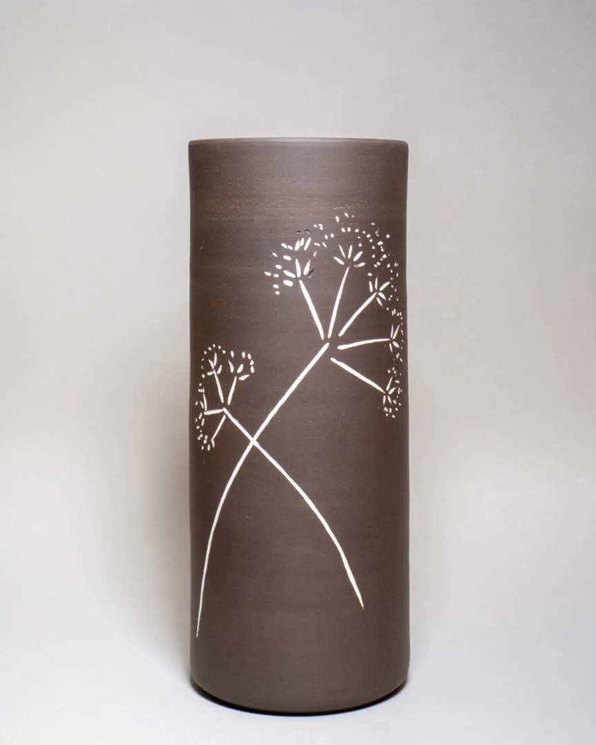 Black stoneware vase with white decoration