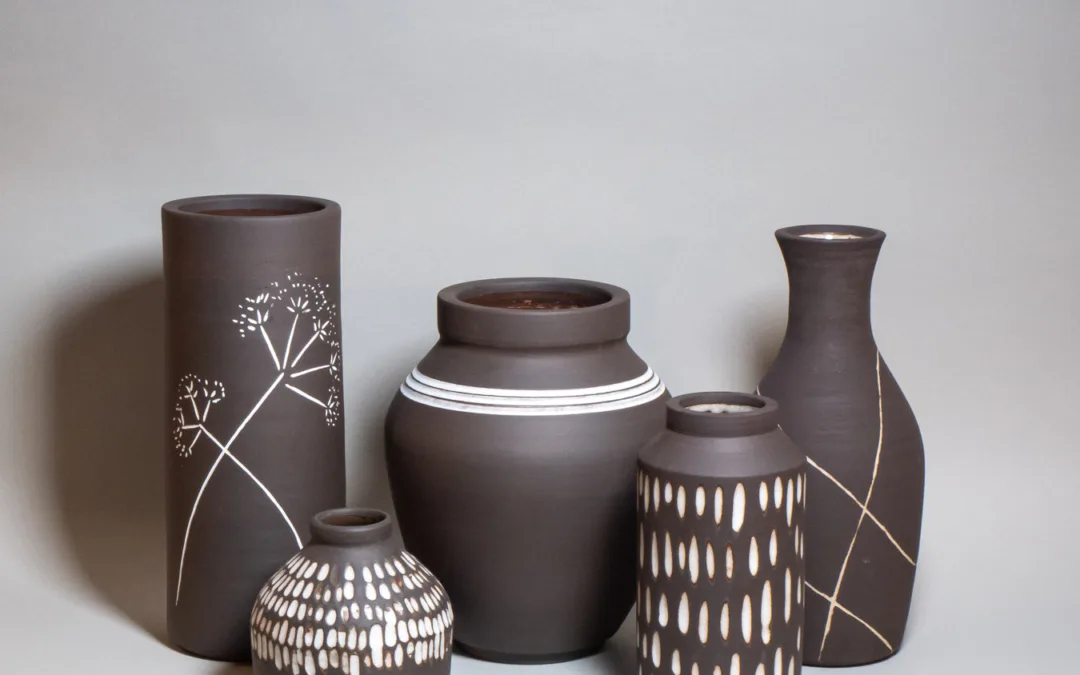 Black stoneware vases with white contrasting decoration